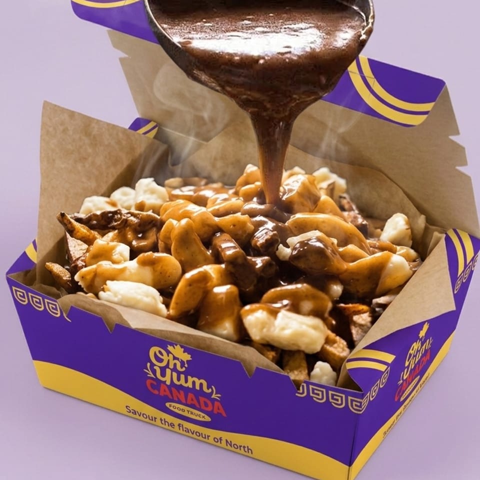 Steaming poutine topped with cheese curds and gravy in a purple and yellow Oh My Yum Canada food truck box.